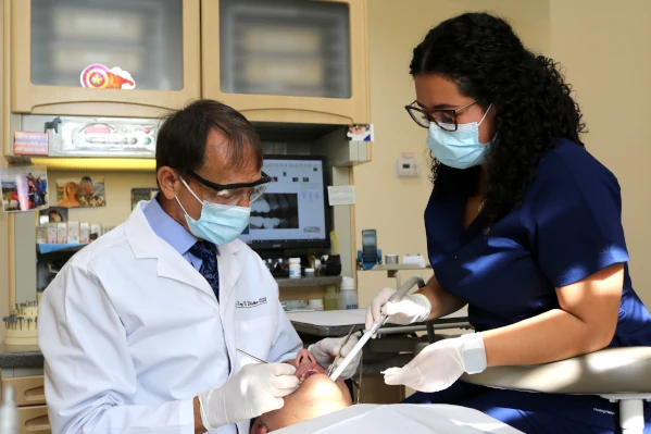 A smiling male Jupiter patient from Roy C. Blake III, DDS, MSD, Maxillofacial Prosthodontist.