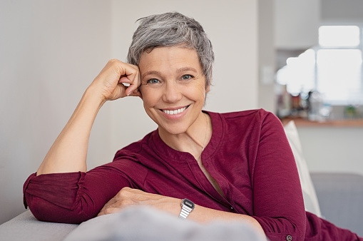 A patient after her first visit at Jupiter's Roy C. Blake III, DDS, MSD, Maxillofacial Prosthodontist 